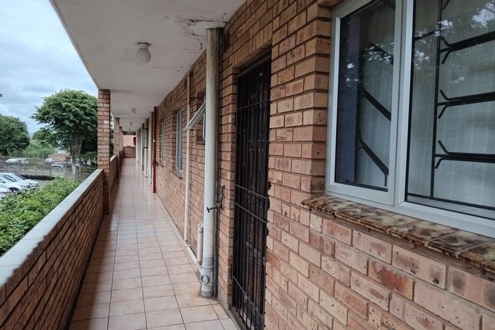 For Sale: Apartment in Empangeni Central with secure access, fitted kitchen, and amenities nearby.