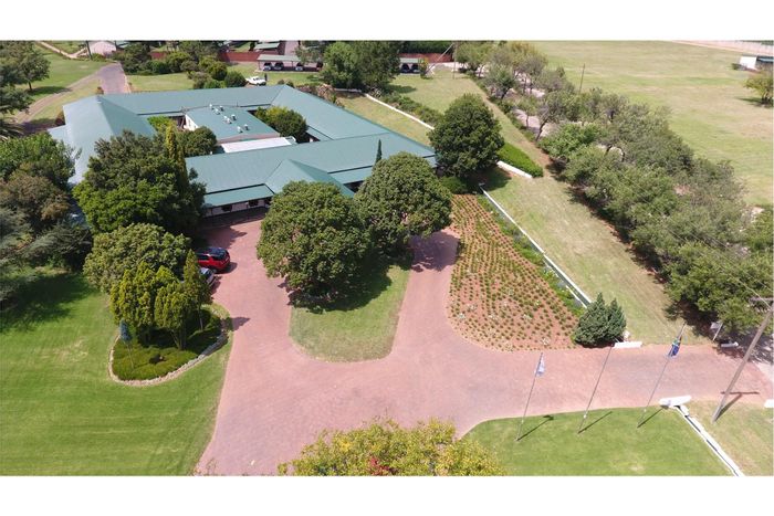 For Sale: Farm in Nooitgedacht with 100-seater auditorium, offices, and recreational amenities.