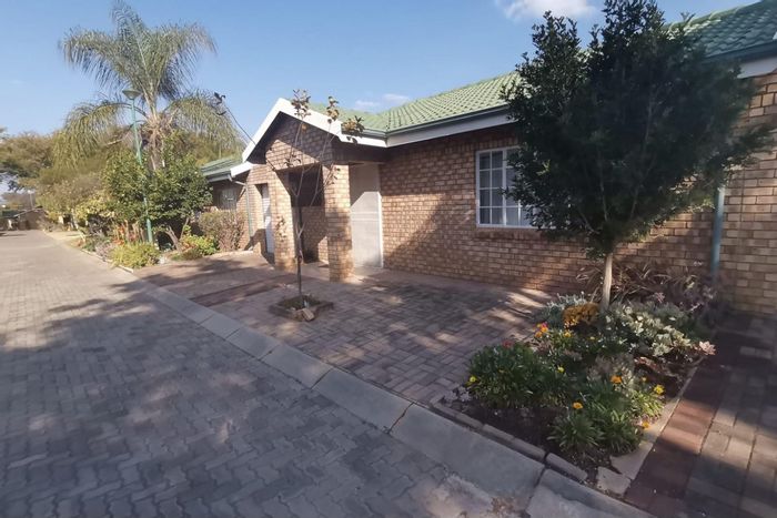 Townhouse for Sale in Bela Bela Central: 2 bedrooms, garage, laundry, security features.