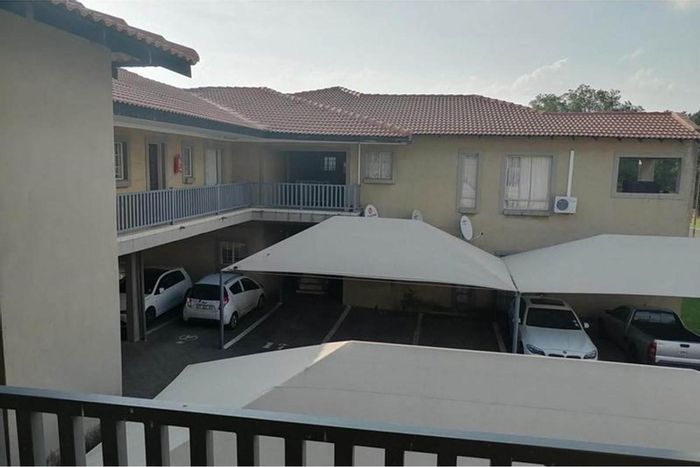 Kriel Central Apartment For Sale: 2 bedrooms, balcony, covered parking, secure complex.