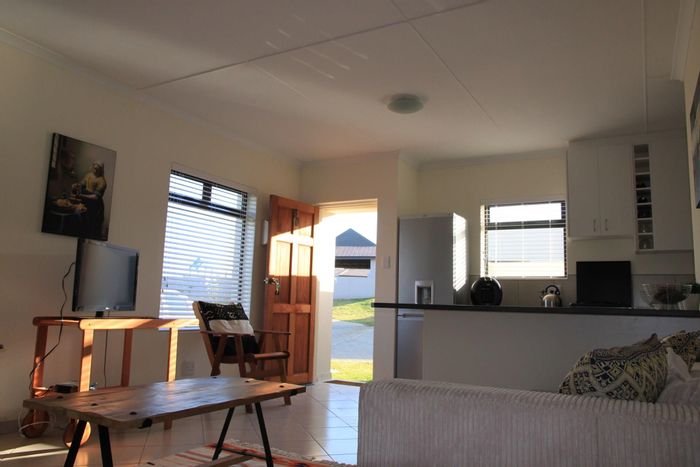 Kidds Beach Townhouse For Sale: 3 Bedrooms, garage, security, and outdoor patio.