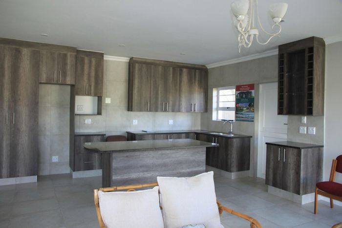 For Sale: House in Kidds Beach with river access, customizable layouts, and double garage.