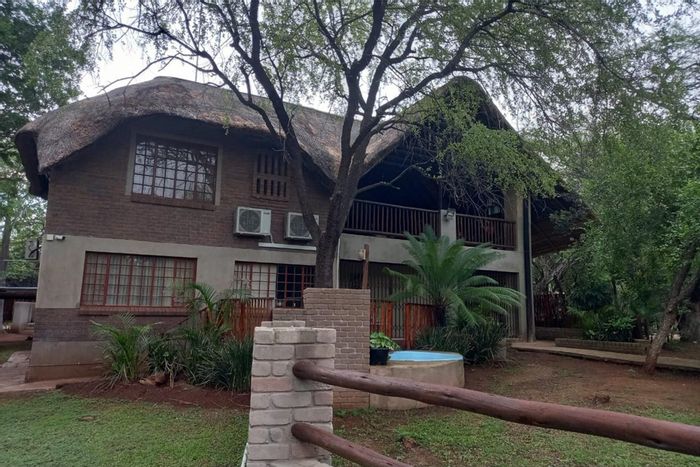 Marloth Park Central House For Sale: Main house, 2 guest units, pool, security.