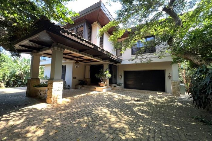 Zimbali House For Sale: Double-story design, pool, spacious deck, golf cart parking.