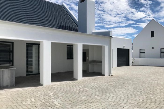 Dwarskersbos House For Sale: Two properties, beach proximity, garages, braai areas, inverter system.