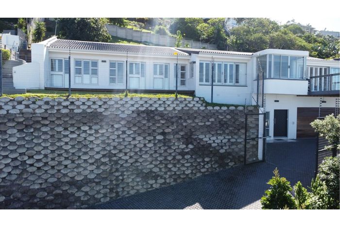 For Sale: House in Ballito Central with ocean views, deck, and security features.