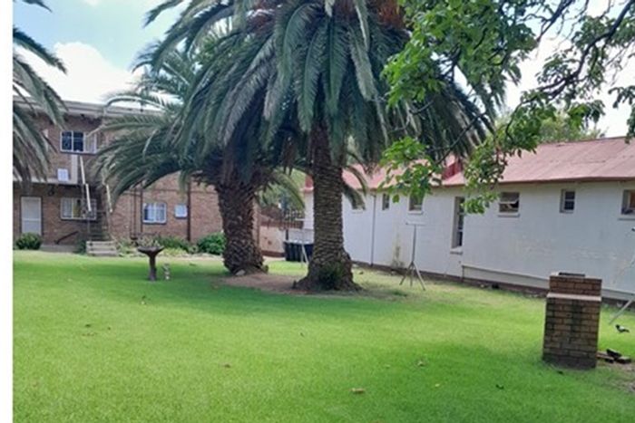 Benoni Central Townhouse For Sale: Ground floor, garage, balcony, spacious living areas.