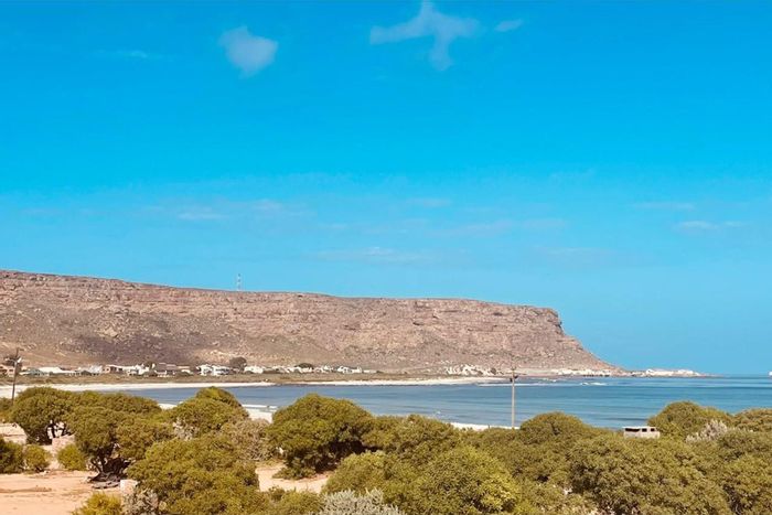 Elands Bay Central House For Sale: Ideal Airbnb with spacious living, garden, and views.