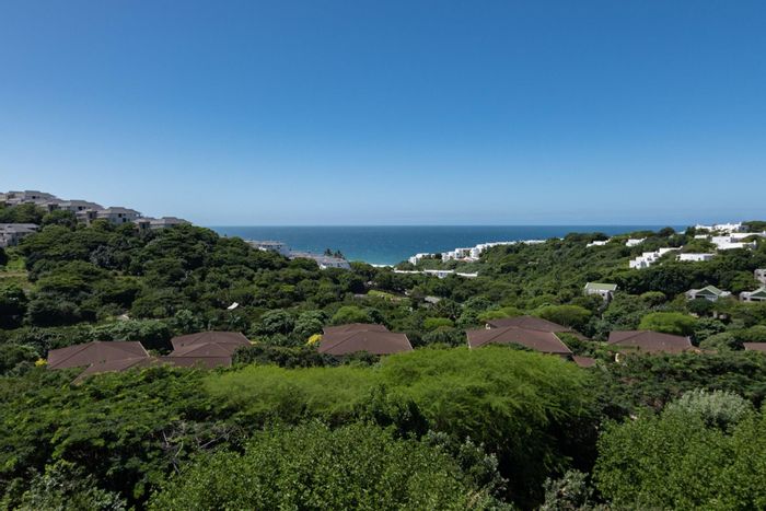 Top-floor apartment in Ballito Central for sale with sea views and amenities.
