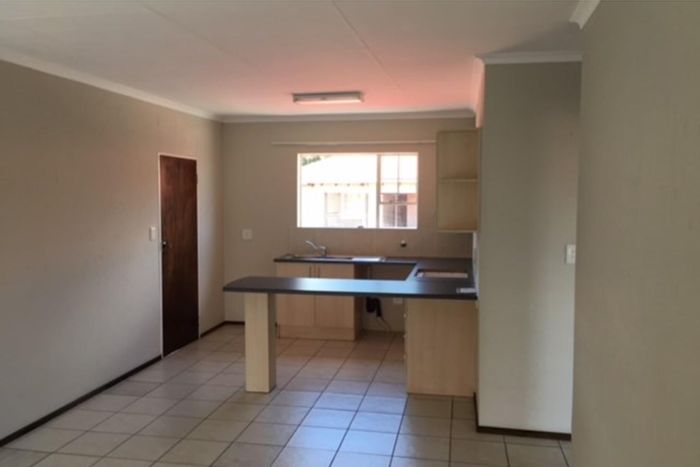 Rynfield Apartment For Sale: 2-bedroom, balcony, close to shops and schools.