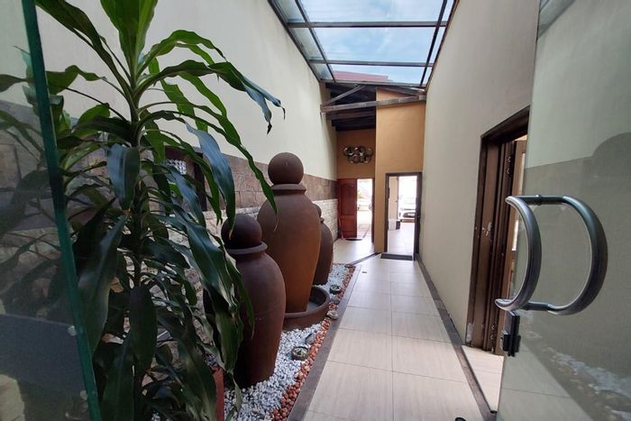 For Sale: Spacious 4-bedroom apartment in Tuzi-Gazi with private garden and garage.