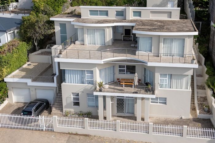 For Sale: Spacious 7-bedroom house in Signal Hill with panoramic ocean views.