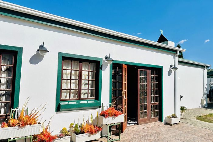 Townhouse For Sale in Volksrust Central: Solar power, braai area, double garage, security.