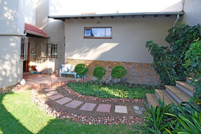 For Sale: Spacious Bryanston house with pool, garden, and secure gated access.