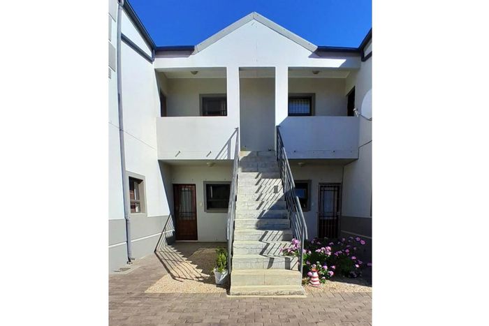 For Sale: Apartment in Moorreesburg Central with 24H security, garage, and balcony.