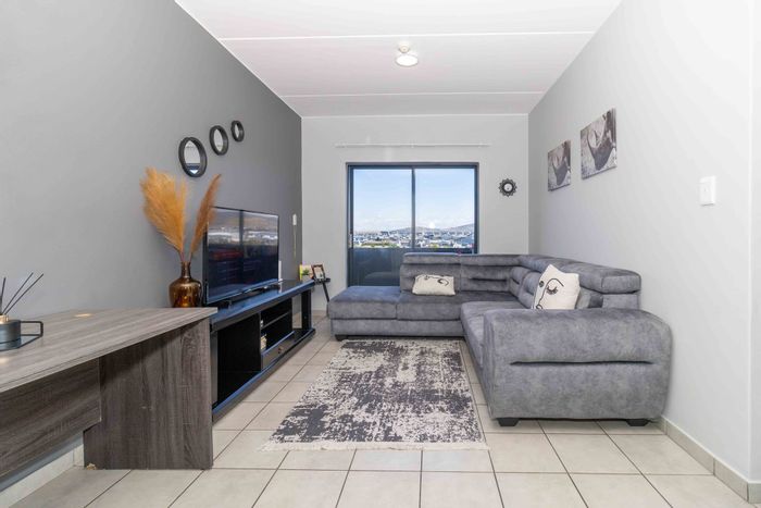 For Sale: Apartment in Parklands North with secure amenities and private balcony.