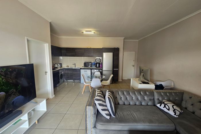 For Sale: Apartment in Modderfontein with gym, pool, and covered parking.