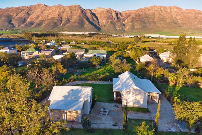 For Sale: House in Porterville Central with three homes, parking, and rental potential.