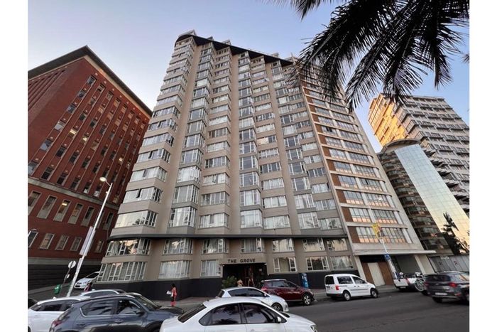 For Sale: Apartment in Durban Central with harbor views, 24-hour security, rental income.