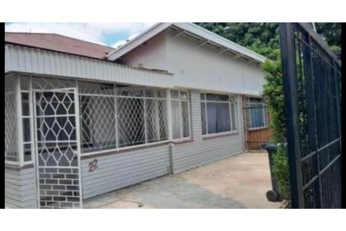 For Sale: Melville House with multiple rental units and ample parking.