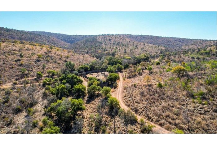 Farm for Sale in Thabazimbi Rural: 906 hectares, game-fenced, borehole, diverse wildlife.