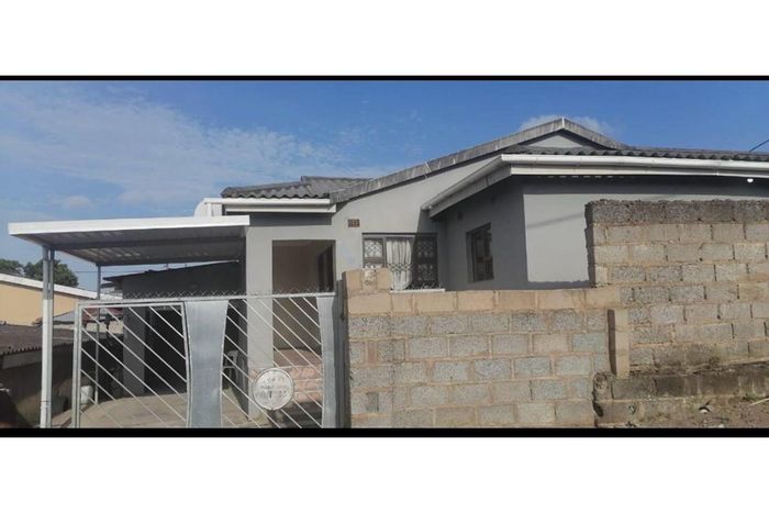 4 Bedroom house in Folweni A for sale, includes garage and carport.