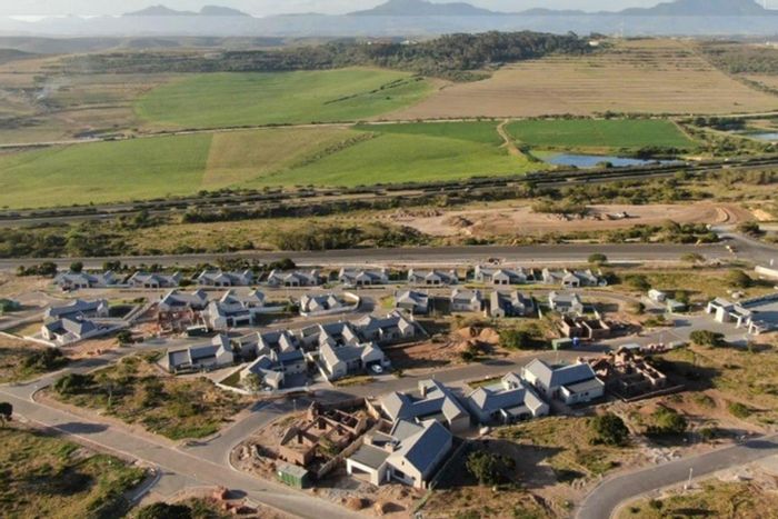 House for Sale in Reebok: Customizable plot, secure estate, pet-friendly, scenic views.