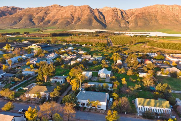 For Sale: Two Erfs with Multiple Homes, Pool, and Mountain Views in Porterville Central.