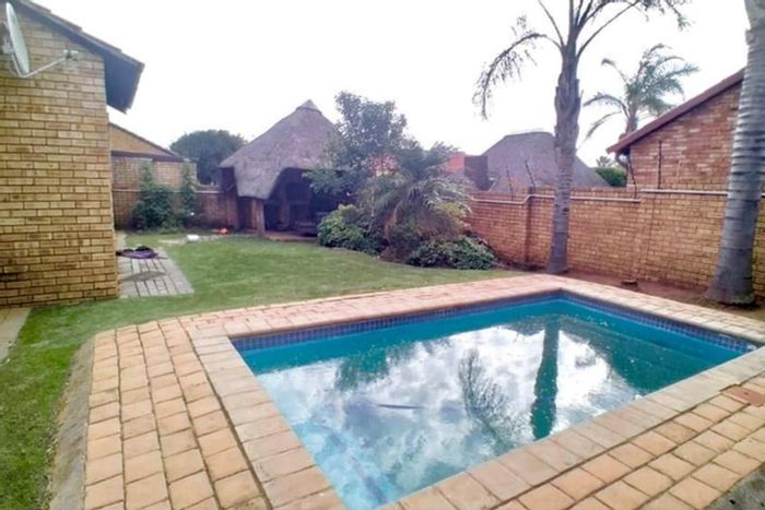 For Sale: Townhouse in Wilgeheuwel with pool, lapa, double garage, and backyard.