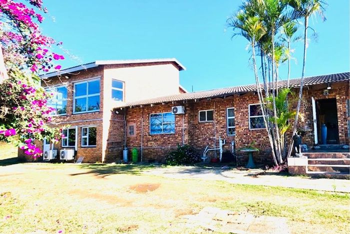 For Sale: Spacious Ashburton house on 8000m², four bedrooms, versatile living spaces.
