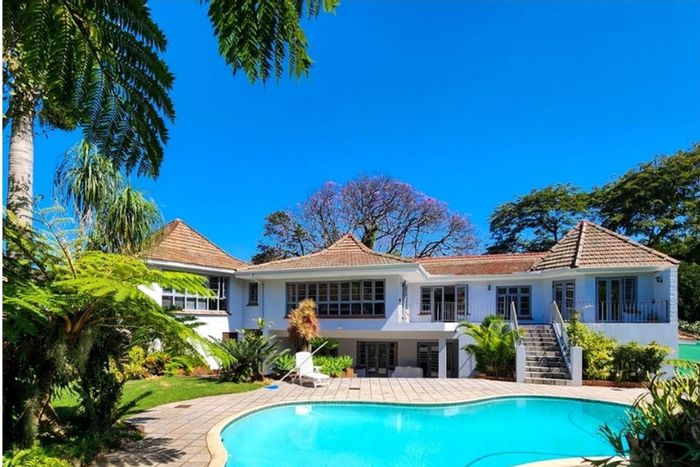 Spacious Durban North Central house with pool, bar, and ample parking for sale.