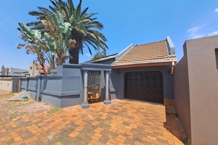 5-Bedroom House for Sale in Lenasia South with Spacious Kitchen and Storage.