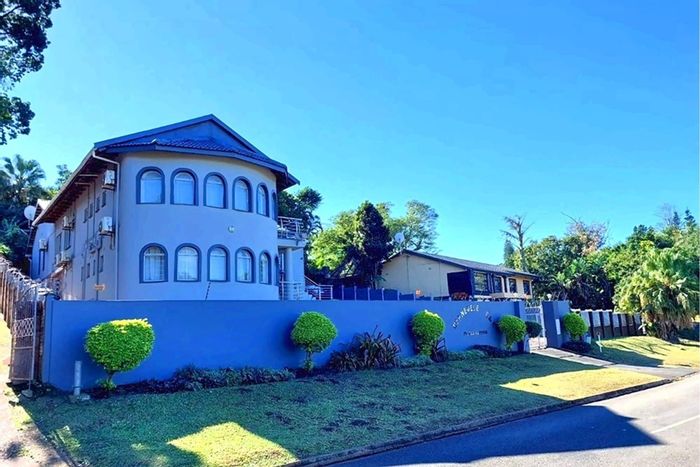 For Sale: Guest House in Fairview with 9 rooms, conference space, and security.