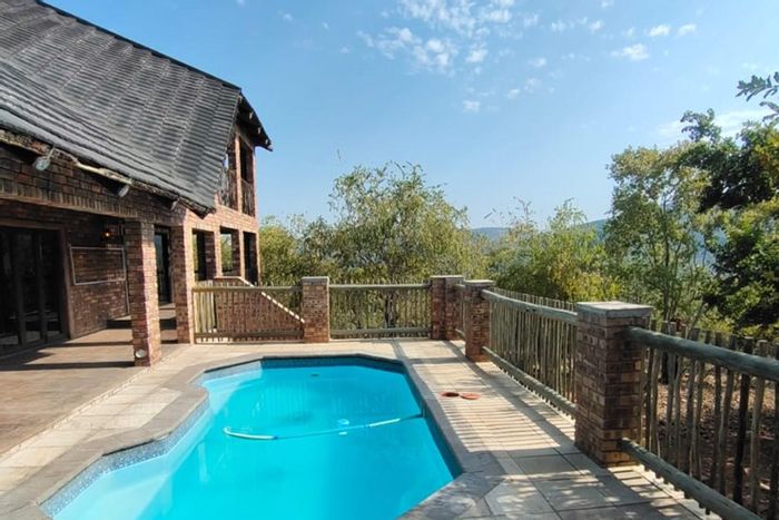 Leeupoort House For Sale: Includes furniture, pool, braai area, and stunning views.