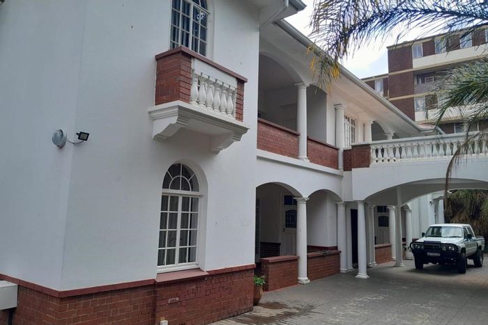 For Sale: Versatile 22-bedroom house in Arcadia with ample parking and facilities.