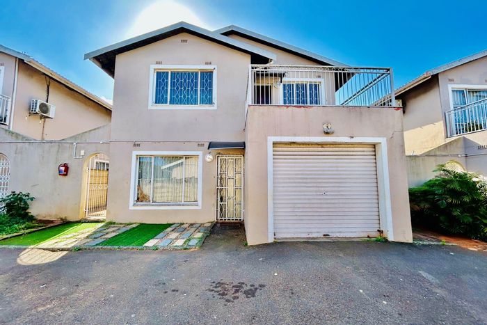 3-Bedroom Townhouse For Sale in Woodlands with balcony, en-suite, and secure parking.