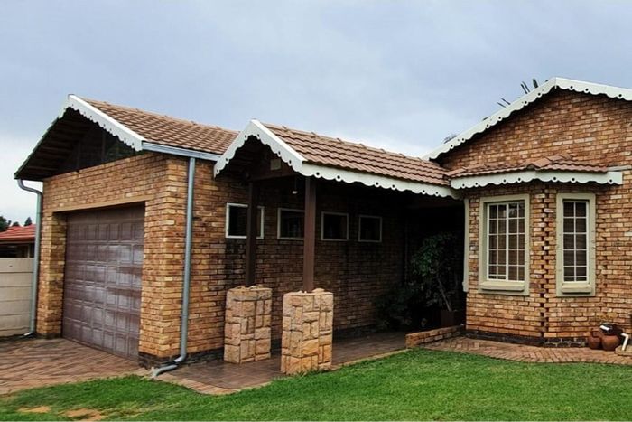 For Sale: Birchleigh House with 4 bedrooms, converted garage, and spacious garden.