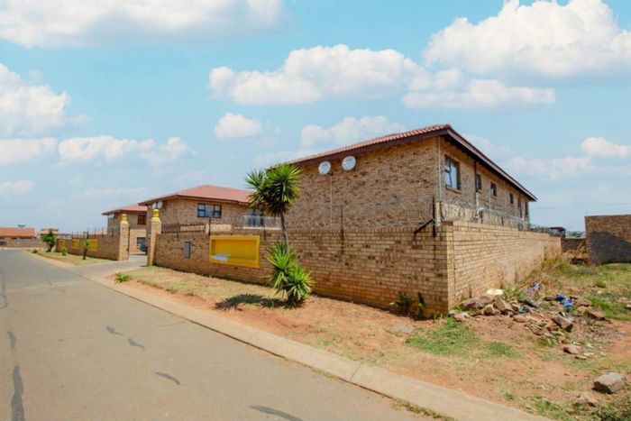 Retail Property For Sale in Lenasia South: 12 apartments, parking, security, steady income.