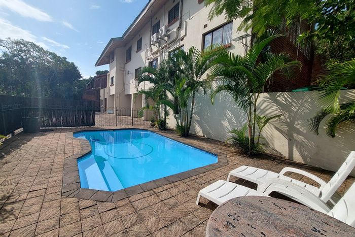 For Sale: Apartment in St Lucia Central with pool, braai area, and office.