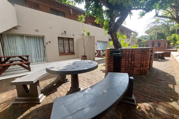 For Sale: Apartment in St Lucia Central with pool, braai area, and rental potential.