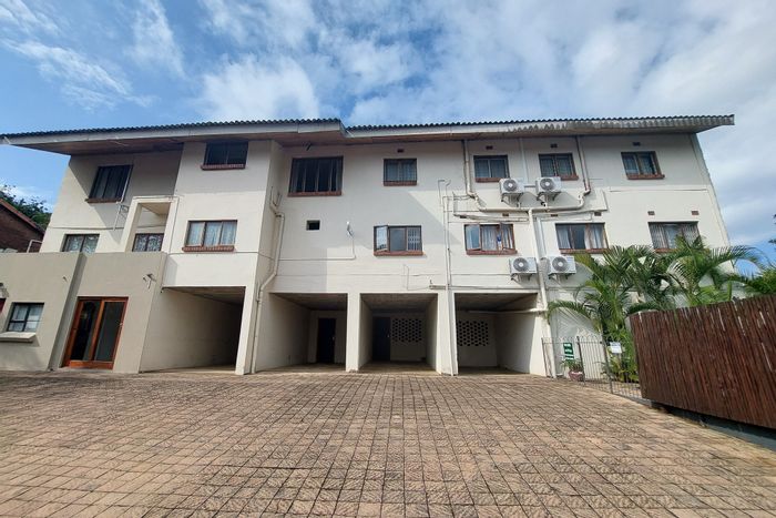 For Sale: Apartment in St Lucia Central with pool, braai area, and Airbnb potential.