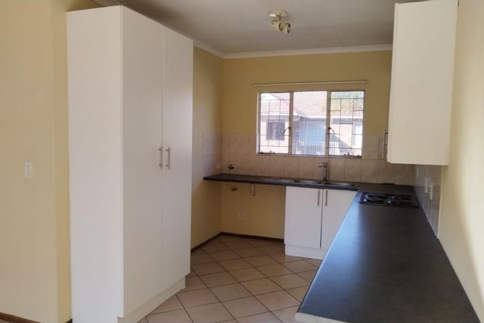 For Sale: 2-bedroom apartment in Highveld with garden, parking, and security features.