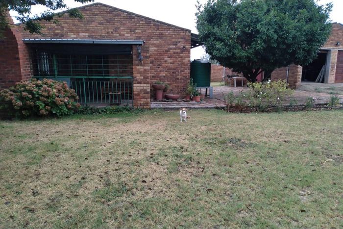 For Sale: House in Villiers with 2 bedrooms, double garage, and built-in braai.