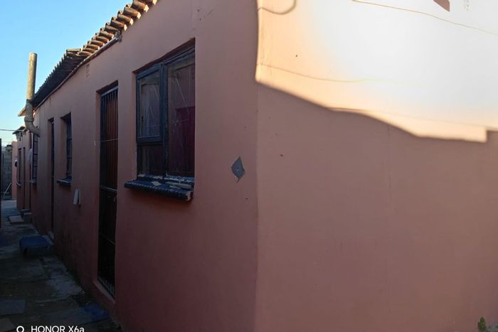 For Sale: New Brighton House with 11 rooms, rental income potential, fully enclosed.