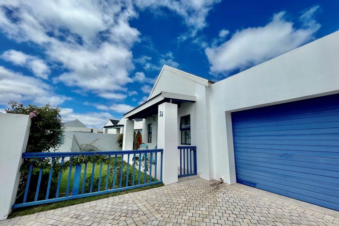 For Sale: House in Blue Lagoon with three bedrooms, jacuzzi, and double garage.