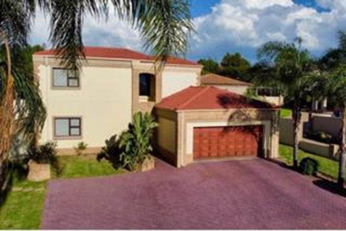 For Sale: House in Blue Valley Golf Estate with pool, garden, and four bedrooms.