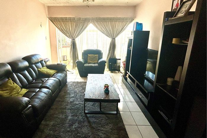 2-Bedroom Apartment For Sale in Vanderbijlpark Cw 2 with balcony and basement parking.