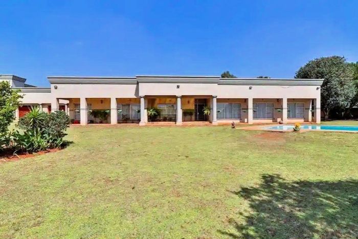 For Sale: Tedderfield AH Small Holding with multiple homes, pool, and entertainment areas.