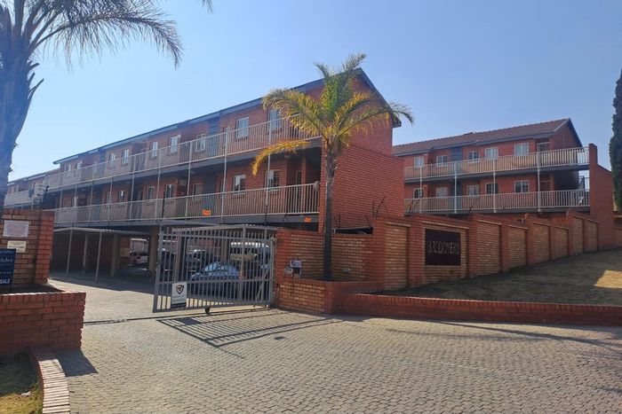 1-Bedroom Apartment for Sale in The Reeds: Secure, with braai area and parking.