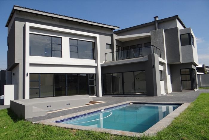 For Sale: House in Midstream Heights with pool, study, and triple garage.